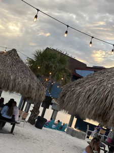 Beach area with hut style seating at Whiskey Joes in Tampa Florida